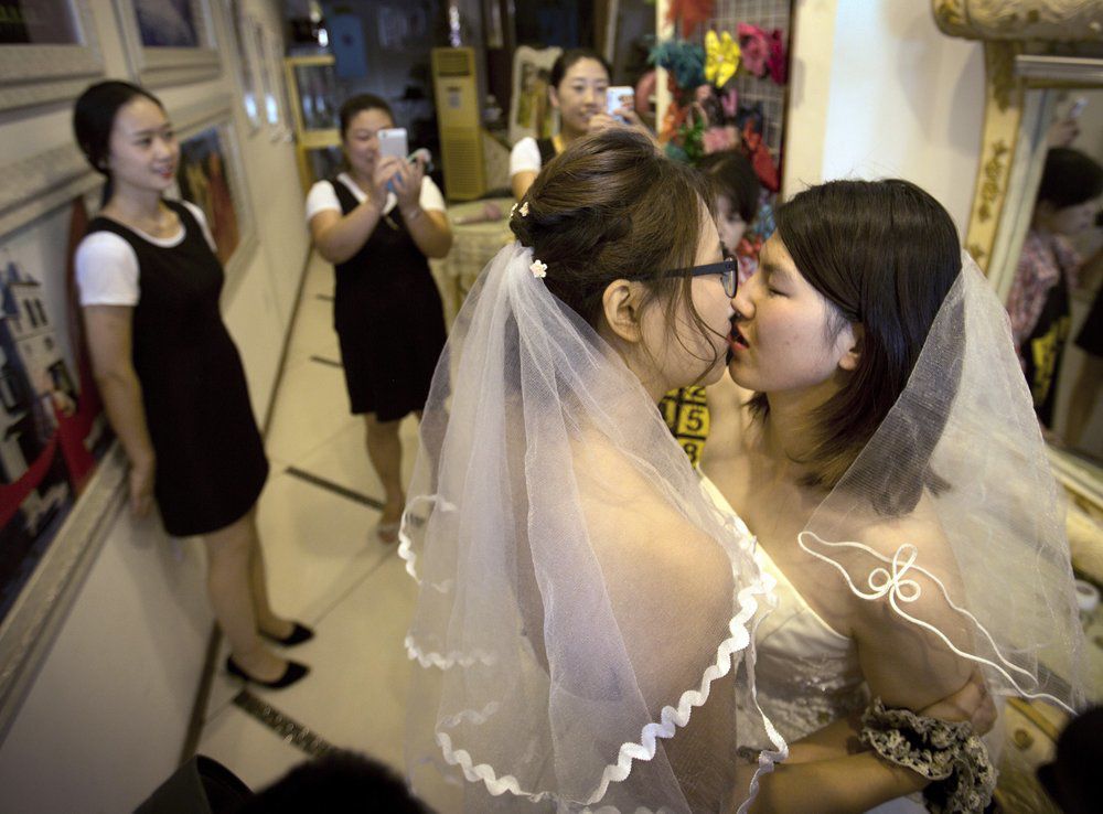 Chinese Same Sex Couple Kissing